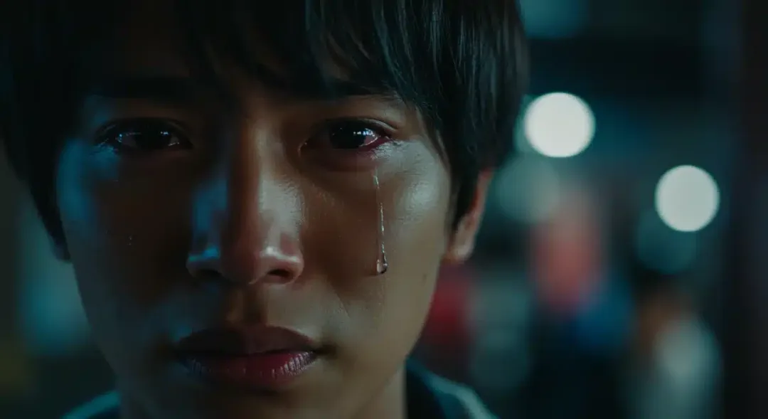 Close-up of a tearful actor, symbolizing heartbreaking dorama moments.