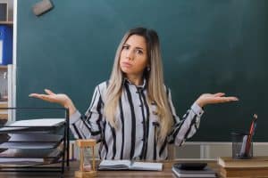 young woman teacher having doubts about Trump administration's education overhaul 3
